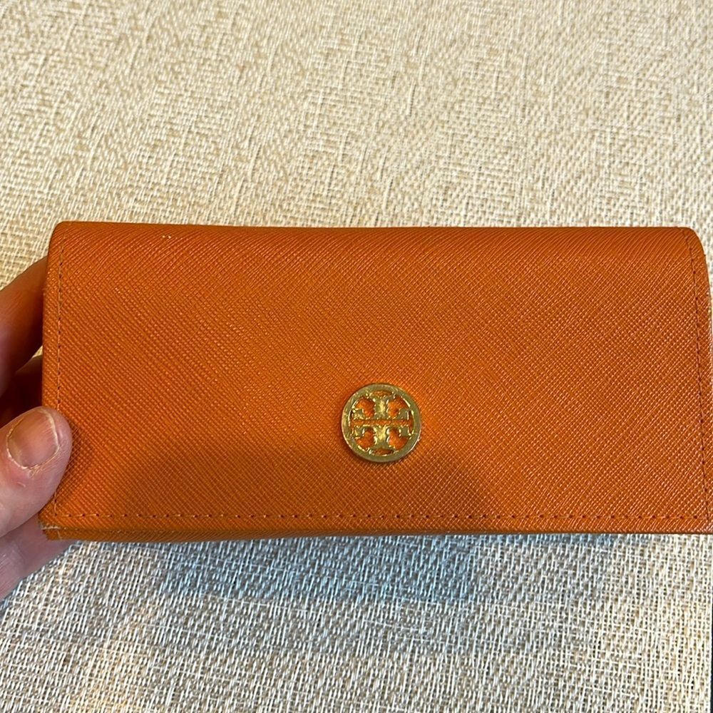 Tory Burch sunglass case.  Lined just the case!